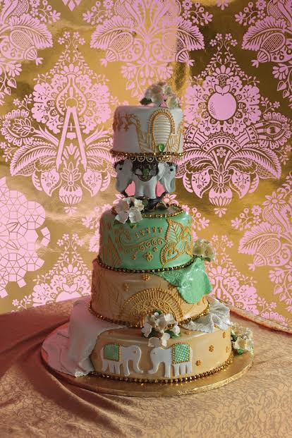 Indian Iinspired wedding cake with hand piped and hand painted henna in royal icing by Michelle Sohan