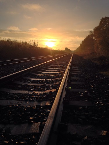 sun train sunrise scotland stirling railway levelcrossing