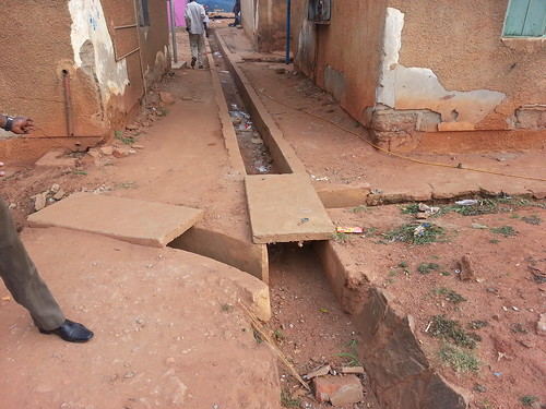 Drainage at the bus park toilet site that needs to be covered by slabs so that wheelchairs can access the site