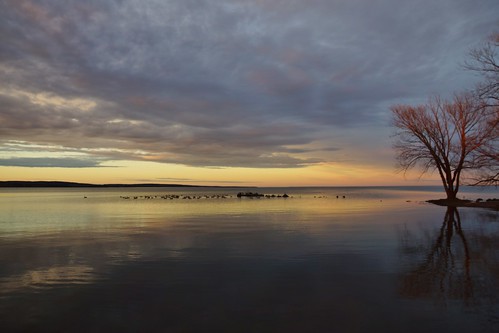 bay sunset evening tree lakesuperior water wi wisconsin ashland lake reflection fall autumn