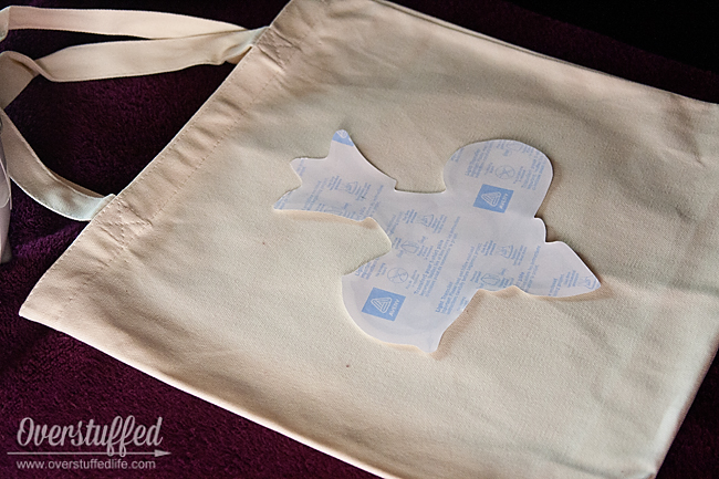 Use iron-on transfers to make a personalized book bag