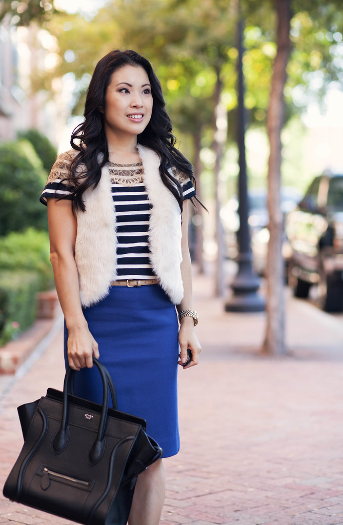 cute & little blog | white fur vest, nautical striped lace top, j. crew blue pencil skirt, sole society tierra black gold cap toe, celine mini luggage tote outfit #ootd