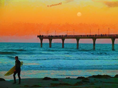ocean blue sunset sea newzealand christchurch orange moon beach yellow coast pier waves pacific dusk horizon vivid canterbury surfboard southisland lunar hightide newbrighton californiadreaming