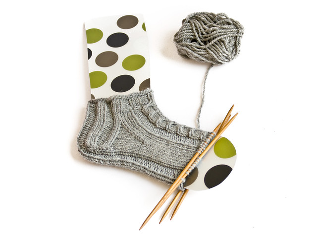 Short aran weight sock with cables in drops alaska
