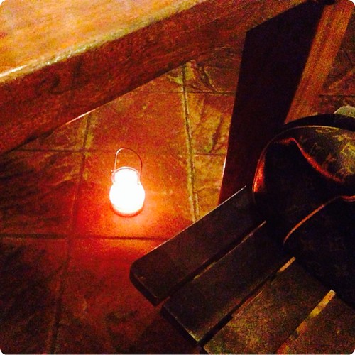 Candle under the table
