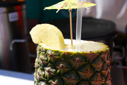 pineapple drink, drink out of a pineapple
