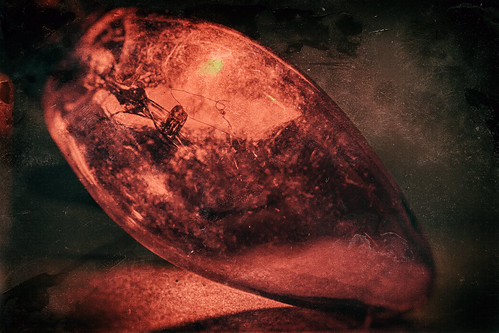 christmas old light red holiday macro texture dusty glass lightbulb closeup bulb vintage nikon glow candle dirty flame worn wetplate candlelight d200 scratched decor hdr tealight filament textured hoya christmaslight c7 closeuplens litbycandlelight niksoftware macromonday hbmike2000 analogefex nikanalogefex flickr12days