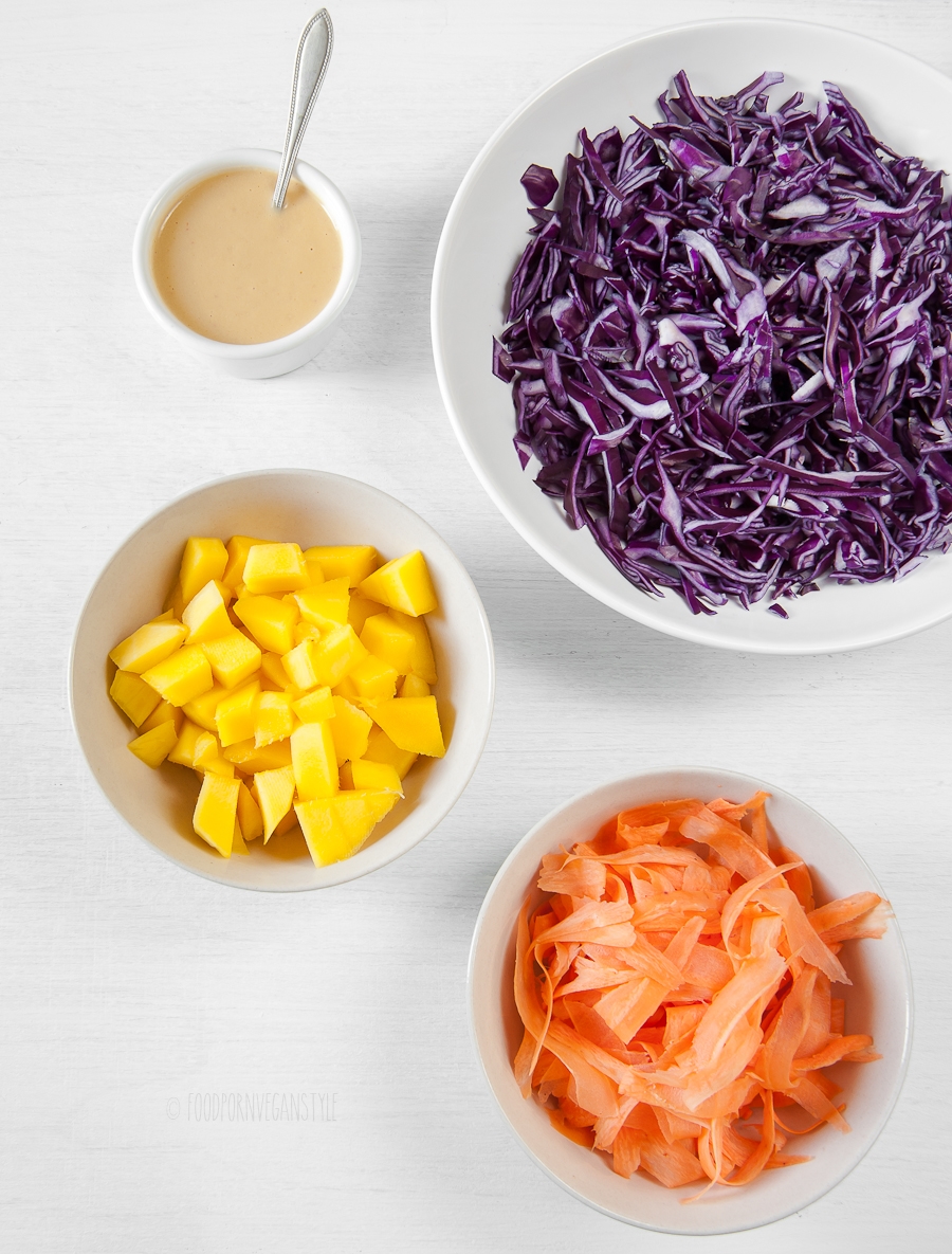 Raw red cabbage salad with mango and miso dressing