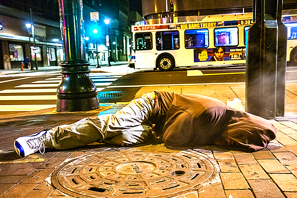 Man-on-sidewalk-at-13th-and-Market-on-10-15-13--Center-City
