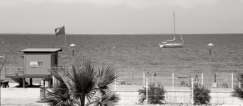 trees sea urban beach lines fence boats spain mediterranean european flag perspective lifeguard palm hut repetition lamanga