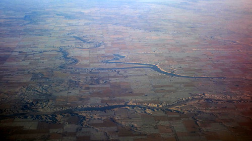 winter snow river frozen flat aerial fields farms meander saskatchewan plains