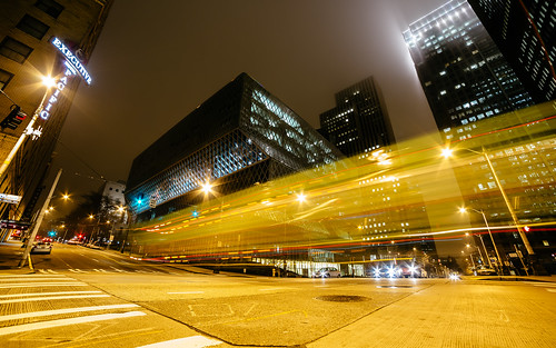 seattle seattlecentrallibrary longexposure lighttrails streaks city 4thst intersection street canon pacificnorthwest morning traffic downtown buildings fog foggy architecture wideangle canoneos5dmarkiii samyang14mmf28ifedmcaspherical johnwestrock washington