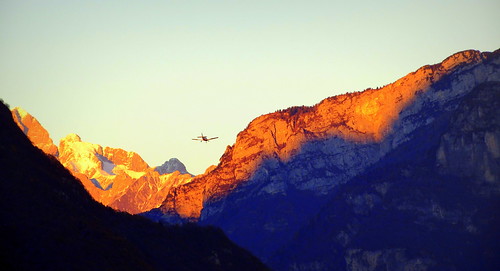 sunset airplane dolomiti belluno italy alps