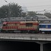 Diesel-electric loco DF7G 5034  shunting a passenger train @ Beijing West Station