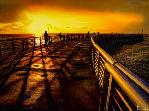 orange wet silhouette yellow clouds sunrise fishing shadows jetty stormy inlet sunrays hdr boyntonbeach