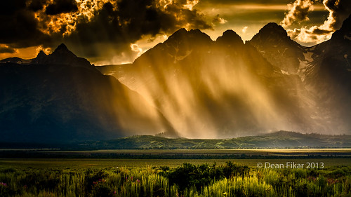 summer mountain storm mountains green grass weather clouds dark high day afternoon shadows unitedstates ominous hill sunny moose wyoming tetons grandtetonnationalpark