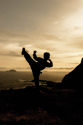 sunset people sun male men art nature silhouette sport pose person fight fighter sundown exercise cloudy action martial kick body leg lifestyle east demonstration master karate health edge harmony warrior kung fu combat limb stunt active mental skill