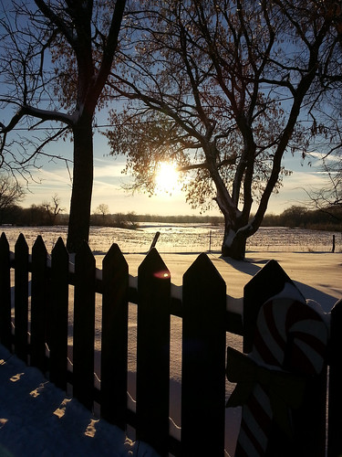 snow sunrise fence
