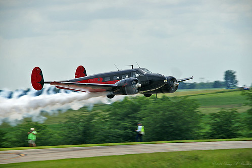 red black airplane airshow aerobatics radialengine beech18 twinbeech mattyounkin smokeon cameronmo younkinairshows