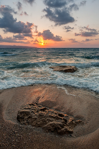 sunset sea sky beach clouds sand topf50 rocks waves 500v20f greece foam crete canonef2470mmf28lusm gettyimages canoneos5d 1000v40f gettyimages:dateadded=20140312