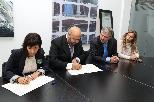 Firma del protocolo de colaboración entre Jaime Martínez e Itziar Epalza.