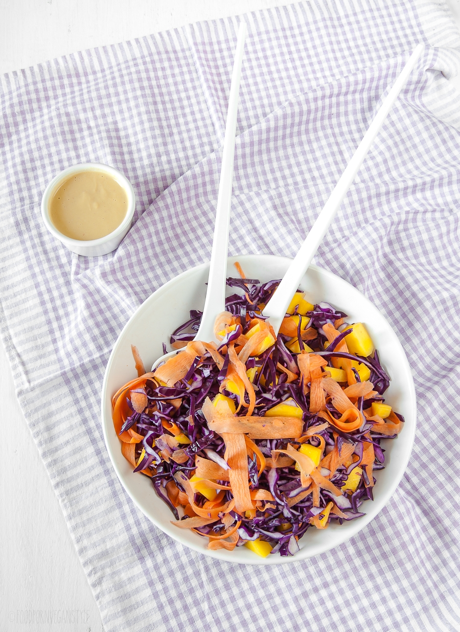 Raw red cabbage salad with mango and miso dressing
