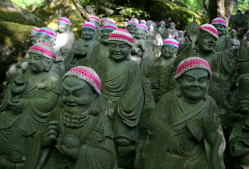 Buddhas in knitted hats