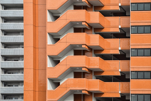 city windows shadow sky urban orange color building colors japan skyline facade buildings outside high construction colorful downtown cityscape chaos colours afternoon apartment flat top balcony platform center shades business shade crop highrise unfinished balconies fukuoka rise sprawl residential financial viewing airco bigcity populated fullyfilled stairspf