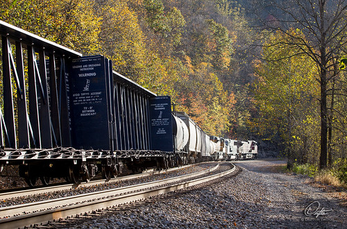 ns norfolksouthern freight train trains track tracks rail rails railroad railway curve outdoor outside big four wv westvirginia westbound kimball 195 country mcdowell county sunlight sunset sunlit glint locomotive car