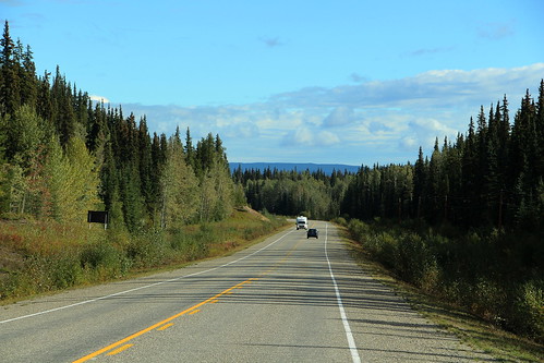 canada yukon territory highway landscape scenery lake mountains road forest nature town