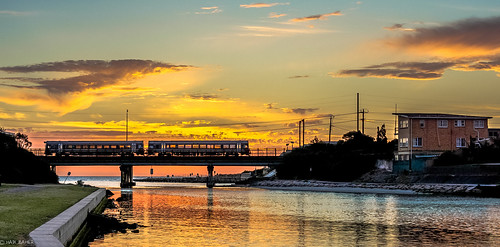 bridge sunset sun lake reflection water clouds train dusk australia melbourne victoria patterson frankston