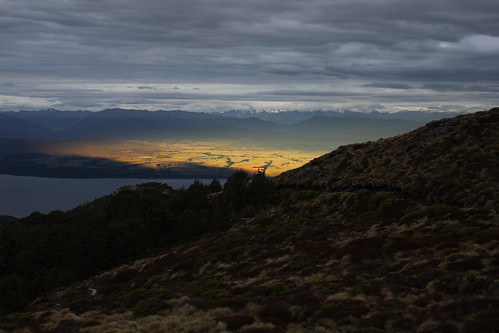 travel light sunset newzealand sky clouds walking evening track hiking tramping kepler fiordland luxmore