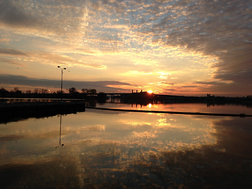 sunset sun clouds reflections ripples anacostiariver washingtonnavyyard