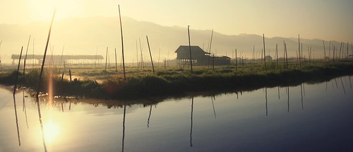 morning travel light house mountains water sunshine gardens sunrise dawn sticks quiet burma calm serenity myanmar inlelake atmospheric shanstate waterscape southeaseasia intothelight floatinggardens fredcan