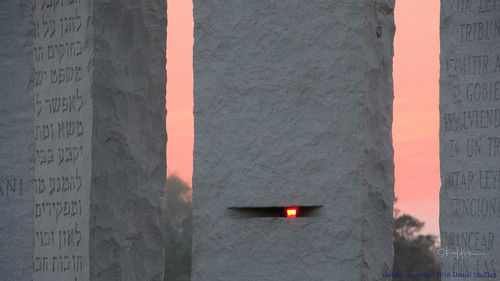 sunset through solstice equinox slot georgia guidestones sheldn canon t5i outdoor sky sun writing text granite stone