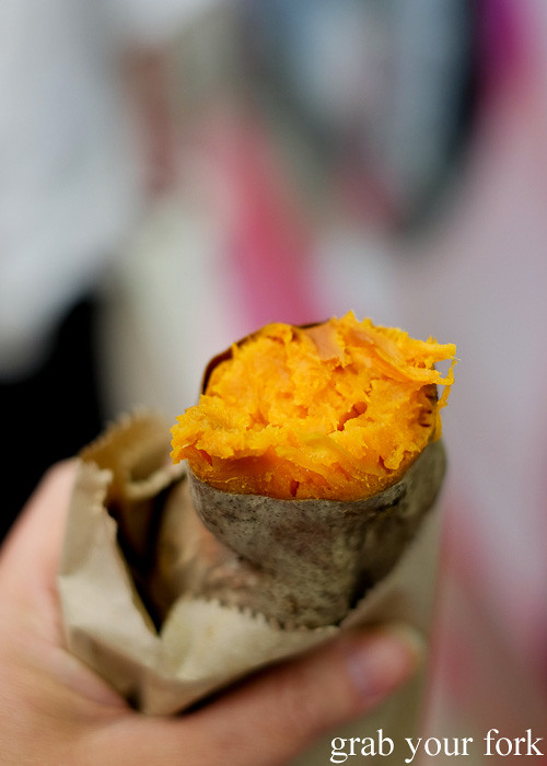 Charcoal roasted sweet potato from a street cart in the Central district, Hong Kong