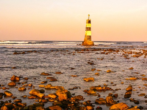 cameraphone lighthouse seascape water landscape southafrica coast rocks indianocean easterncape portelizabeth nelsonmandelabay iphone4 pollockbeach