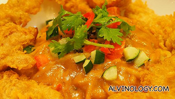 Close-up on the rich curry laksa sauce 