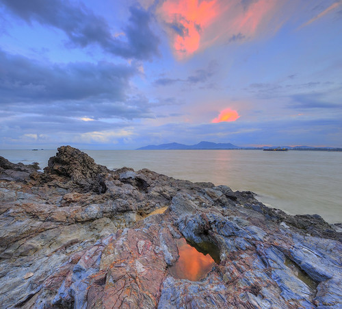 ocean sunset sea reflection beach clouds rural boats landscapes countryside twilight rocks day alone peace fishermen cloudy dusk ships nopeople foliage malaysia jagged remote serene tranquil rugged terengganu dungun fierysky eastcoastmalaysia