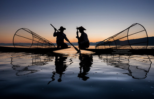sunset sun lake fish silhouette boat fisherman leg getty rowing myanmar inle shan gettyimages fishery taunggyi nyaungshwe
