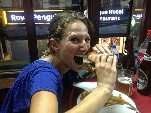 Lina enjoying a burger after our 17 day Everest Trek