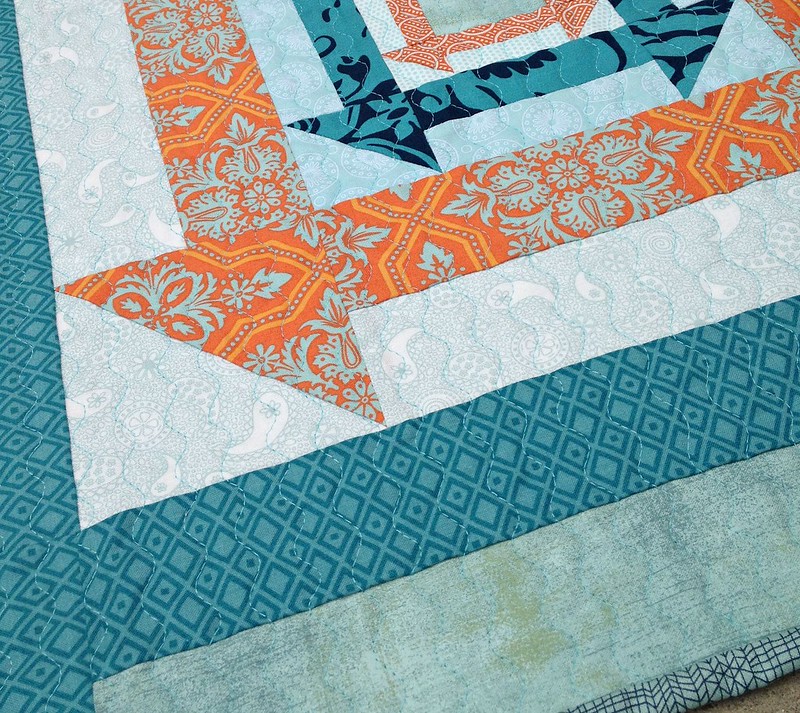 Nested Churn Dash quilting detail