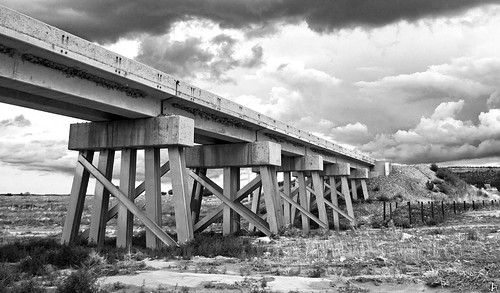 railroad bridge sky blackandwhite bw clouds concrete colorado dramatic railroadbridge drama dwl walsenburg danceswithlight
