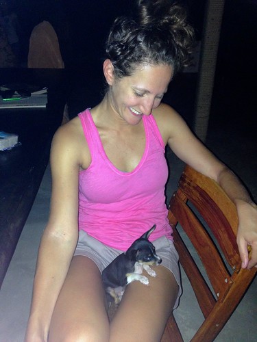 Lina hanging out with the baby puppy at Hostal Monte Verde
