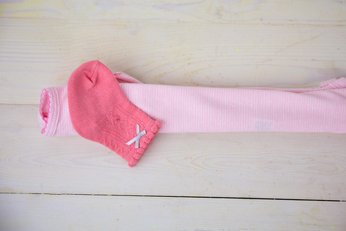 Fold the onesie with a sock inside #SavingsCatcher