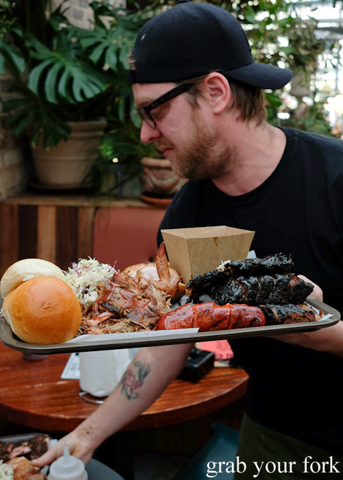 Barbecue meat plate and Chef Jamie Thomas at the Oxford Tavern, Petersham