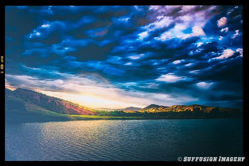 sunset mountains clouds fishing nikon colorado unitedstates loveland flyfishing d200 sylvandaleranch nikkor18200mmvr