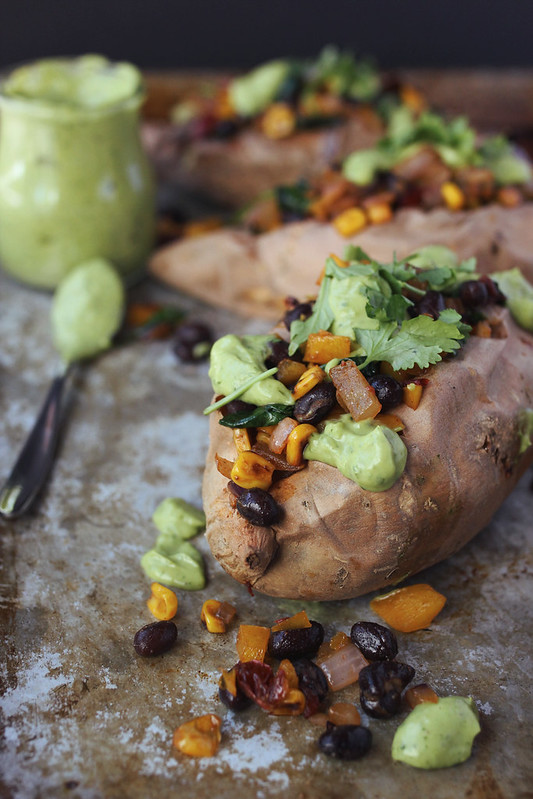 Spicy Southwest Loaded Sweet Potatoes with Cilantro Lime Avocado Cream