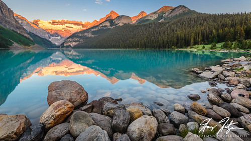 banffnationalpark canadianrockies lakelouise clouds lake mountains reflections rocks sky sunrise alberta canada ca