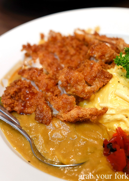 Chicken katsu omelette rice with curry sauce at Pasta Goma, Sydney